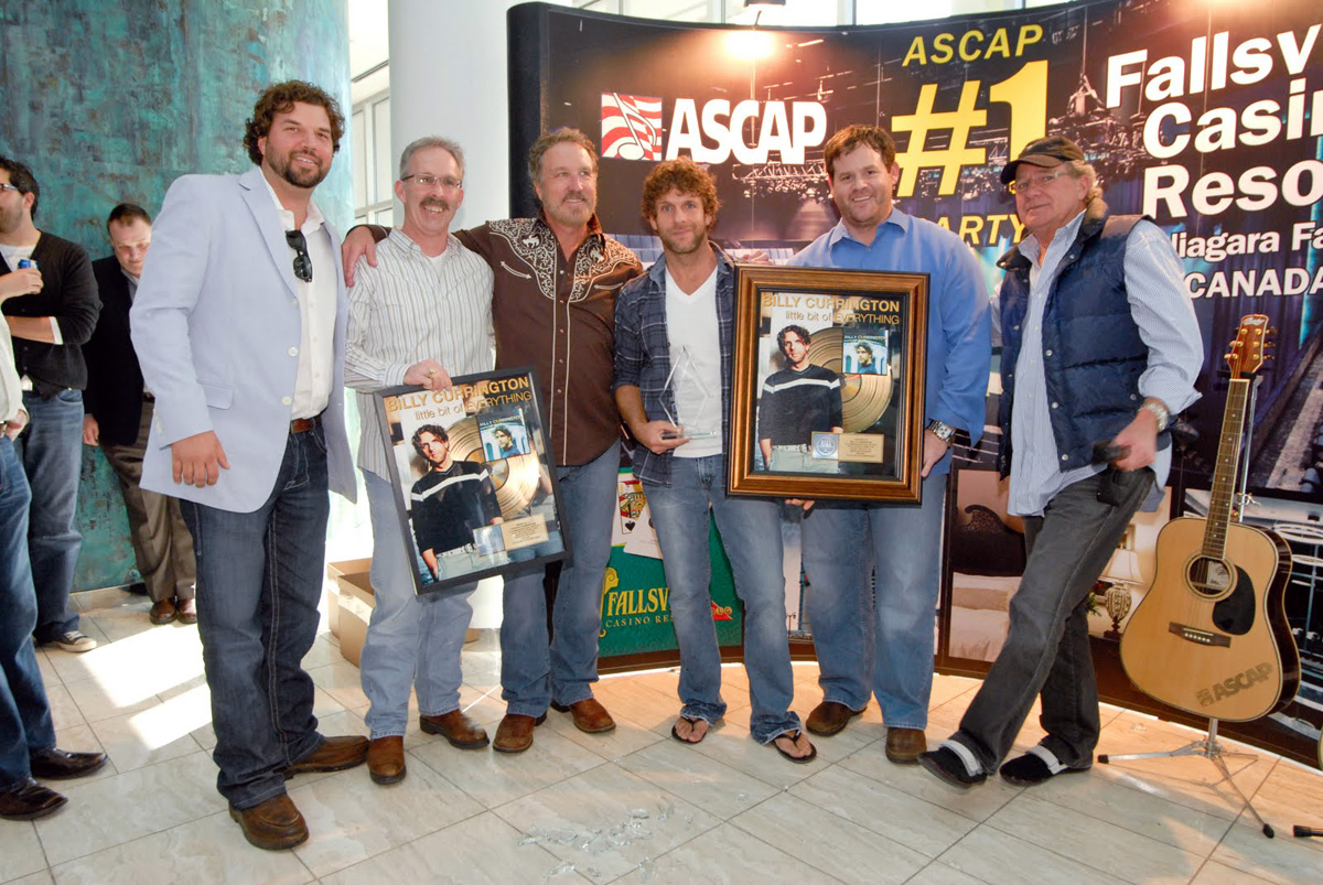 Billy Currington is awarded a gold certification by RIAA