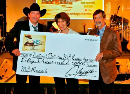 Clay Walker and BAMS donate to Dr. Lauren Krupp