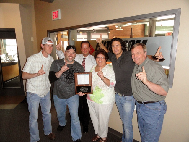WBEE/Rochester, NY presents Joe Nichols with plaque for #1