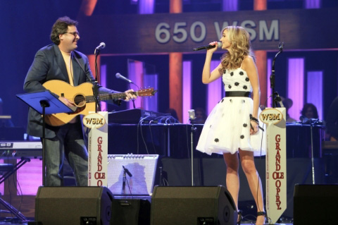 Vince Gill performs with Sarah Darling at the Opry