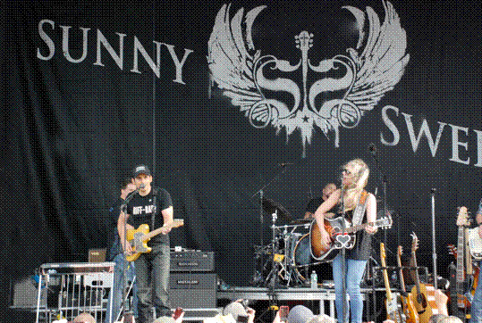 Sunny Sweeney performs with Brad Paisley