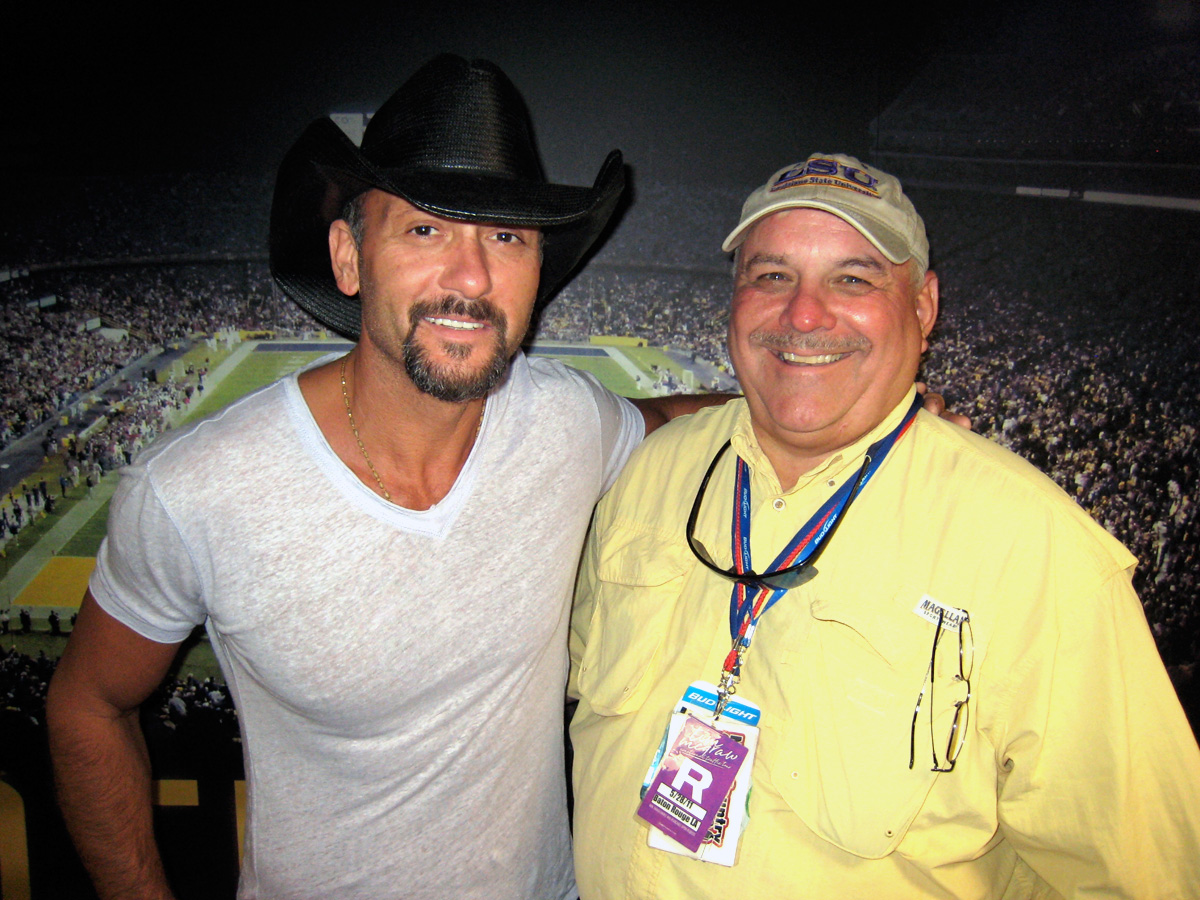 WTGE's Dave Dunaway hangs with Tim McGraw at Bayou Fest