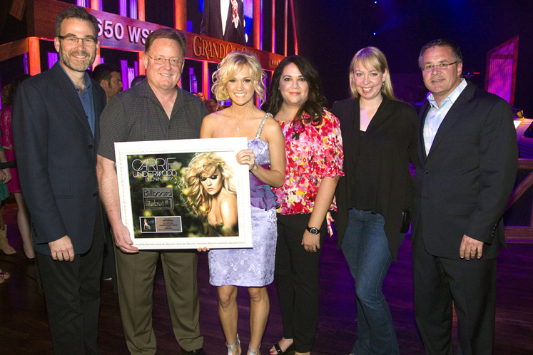 Carrie Underwood receives a plaque