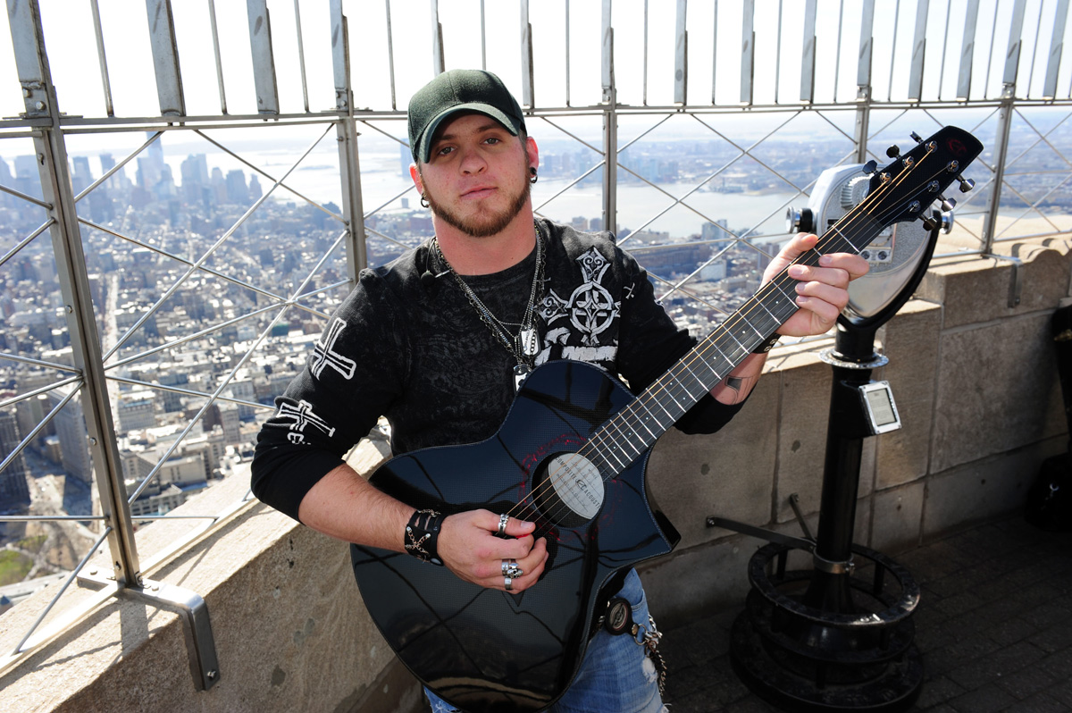Brentley Gilbert perform at the top of the Empire State Bldg
