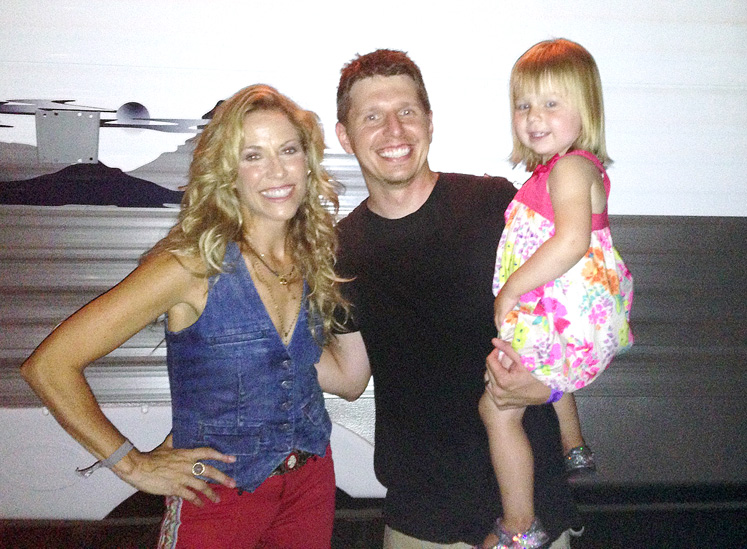 Sherly Crow posses with KMNB'S APD, Kenny Jay and his daughter