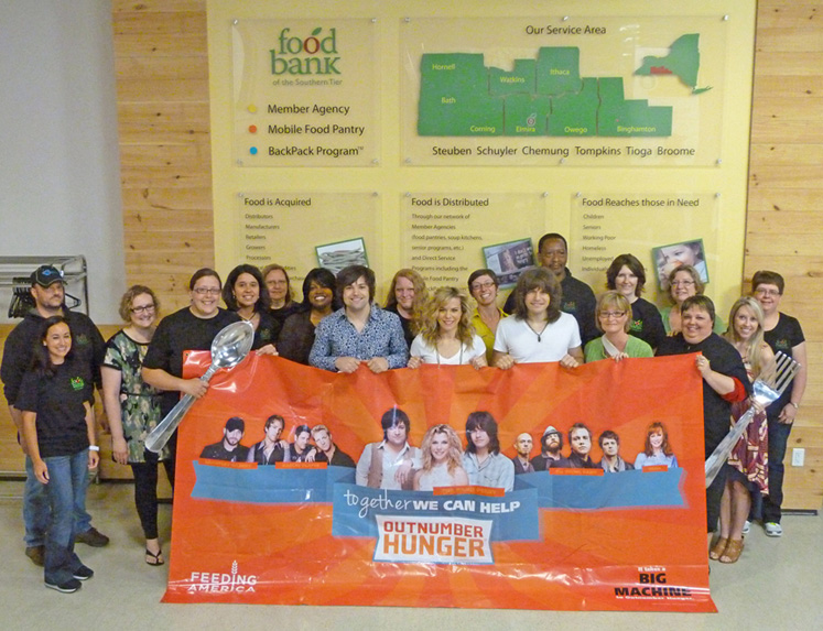 Band Perry visits with the staff of Food Bank of the Southern Tier.