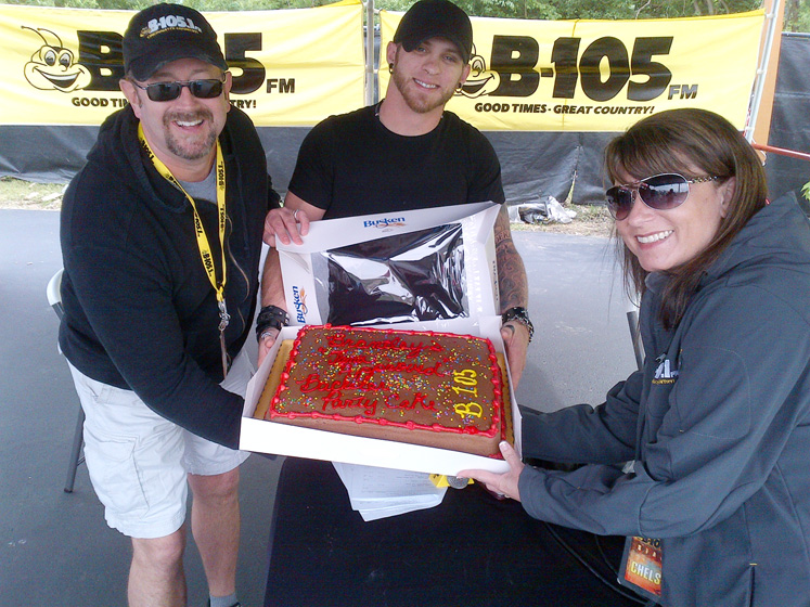 WUBE presents Brantley Gilbert with a bachelor cake