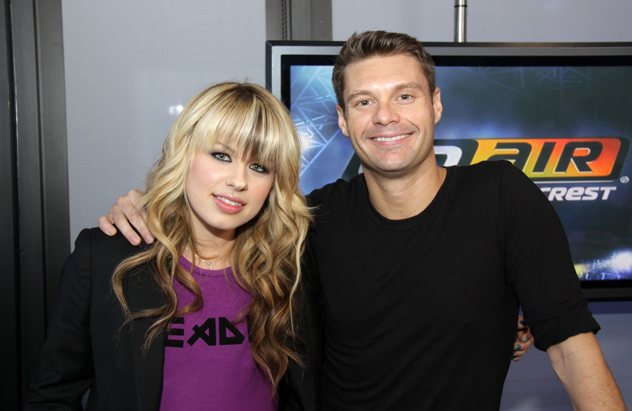 Orianthi hangs with Ryan Seacrest after performance