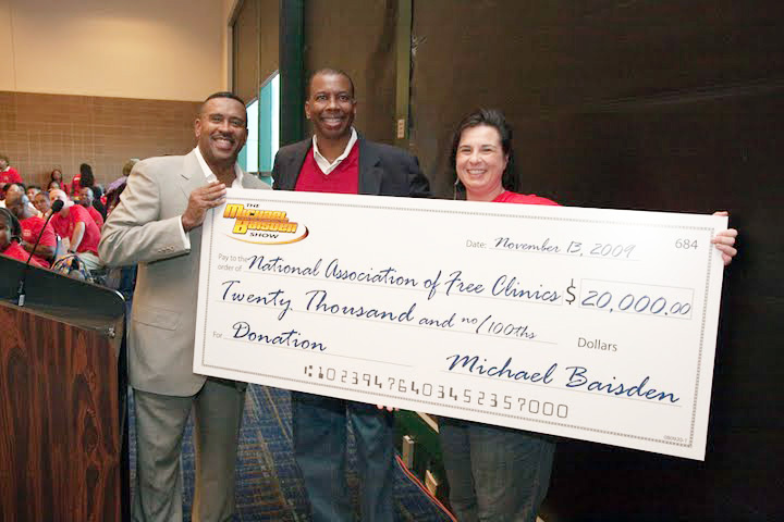 Michael Baisden presents the National Association of Free Clinics with a 20K check